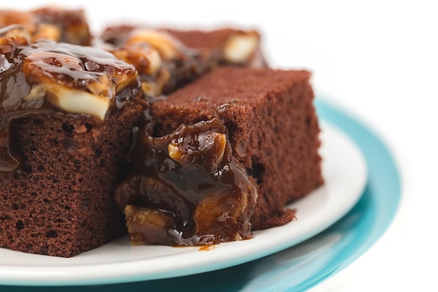 Delicious toffee cake on white background for bakery food and eating concept