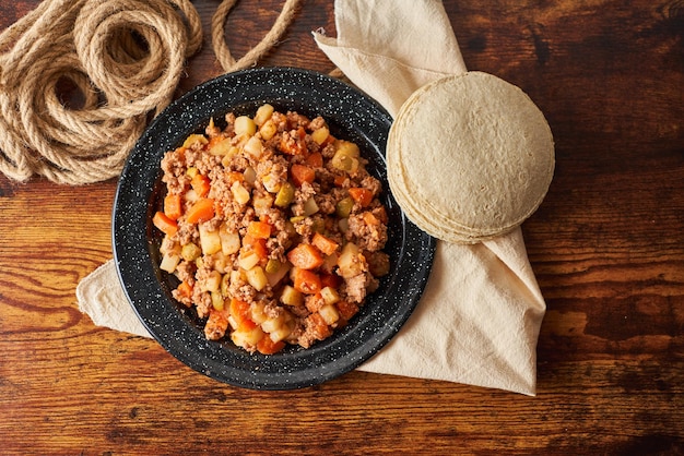 おいしい伝統的なメキシコのピカディージョ タコスとエンパナーダのための風味豊かなシチュー