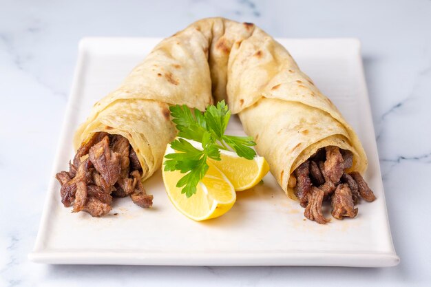 Delicious turkish kebab tantuni. Mersin tantuni durum.