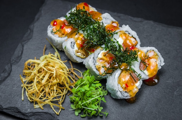 Delicious Uramaki on slate plate