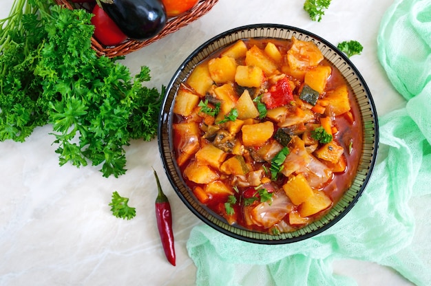 Delicious vegetable stew in a bowl on the table