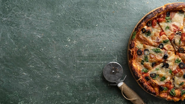 Delicious vegetarian tomato and cheese pizza with greens