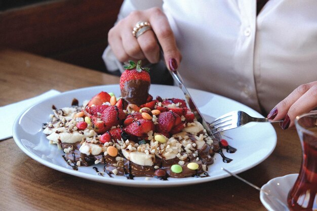 Delicious waffle with chocolate sauce