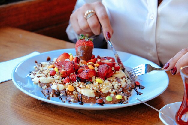 Delicious waffle with chocolate sauce