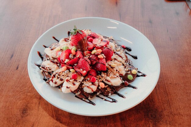 Delicious waffle with chocolate sauce