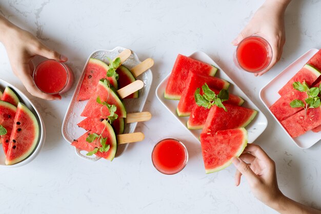 Delicious watermelon summertime snack on a plate. Dessert. Flat lay, top view.