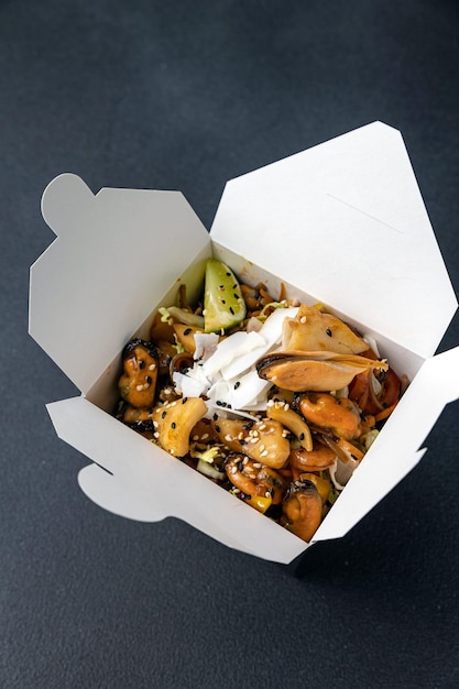 Delicious wok noodles box container . Chinese and asian takeaway fast food.