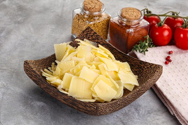 Delicous Sliced parmesan cheese in the bowl