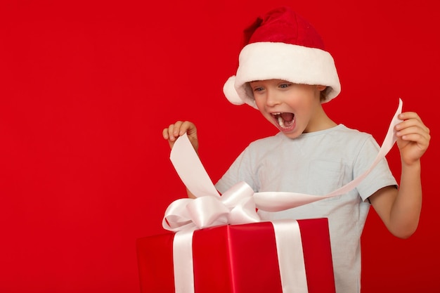 Photo delight of a child who saw a huge box with a christmas gift