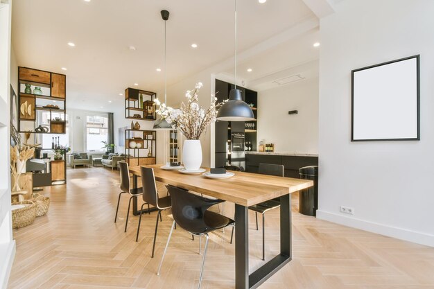 Delightful dining area with two hanging lamps above the table