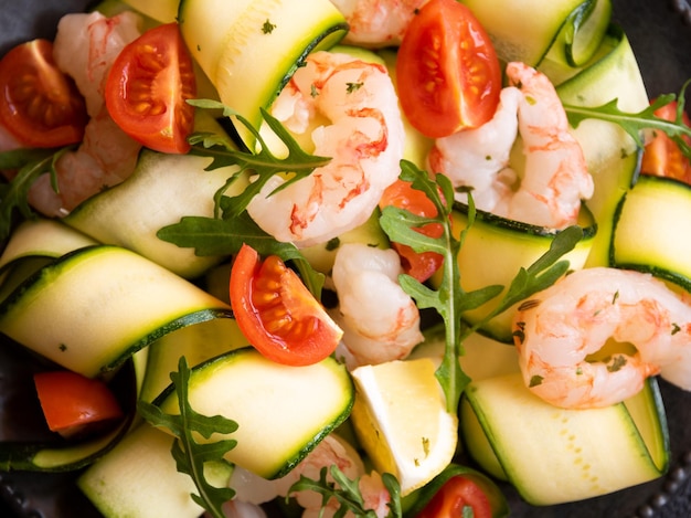 Delisicous fresh seafood salad with shrimps and zucchini