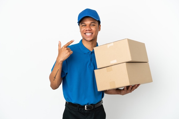 Delivery African American man isolated on white background giving a thumbs up gesture