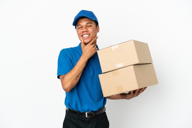 Delivery African American man isolated on white background happy and smiling