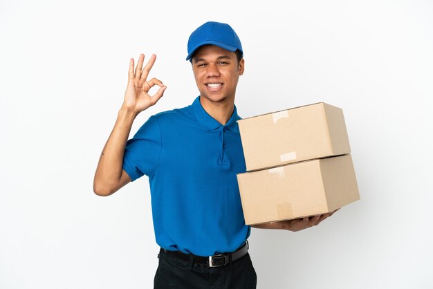 Delivery African American man isolated on white background showing ok sign with fingers