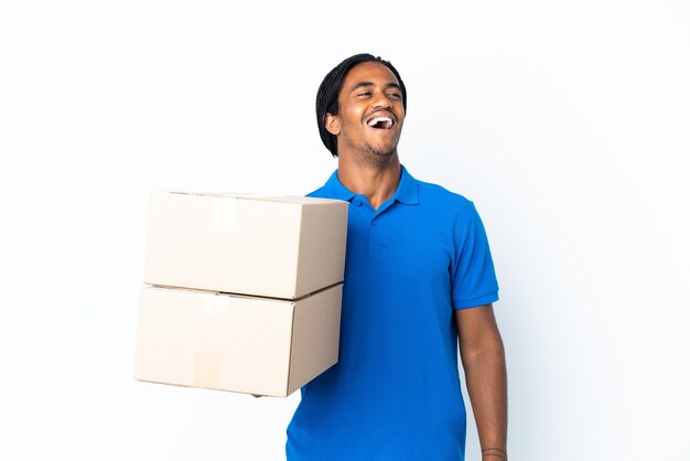 Delivery African American man with braids on white laughing