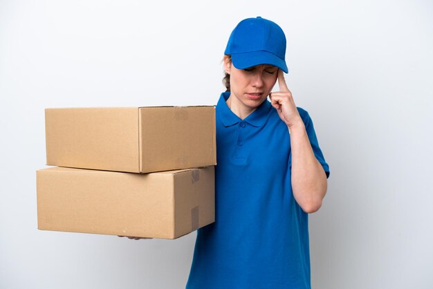 Delivery caucasian woman isolated on white background with headache