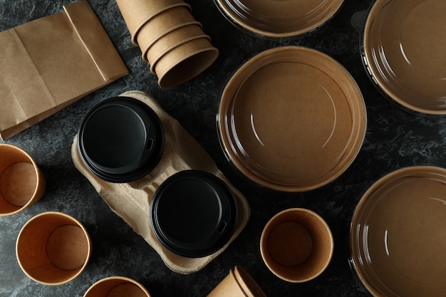 Delivery containers for takeaway food on black smokey table