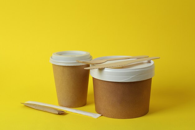 Delivery containers for takeaway food on yellow