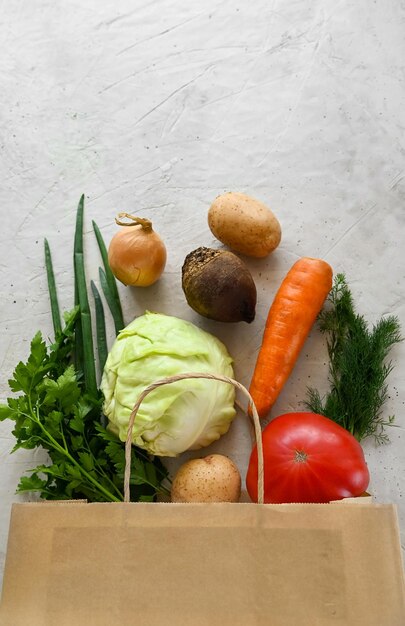 Delivery healthy food background Healthy vegan vegetarian food in paper bag vegetables