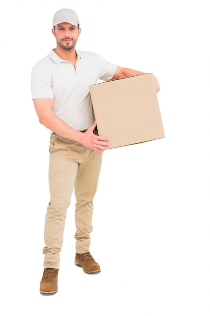 Delivery man carrying cardboard box 