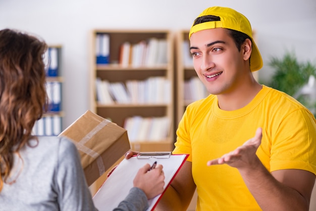 Delivery man delivering parcel box