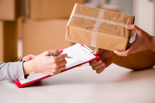 Delivery man delivering parcel box