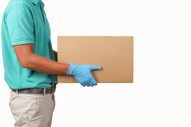 Photo delivery man  holding cardboard boxes on white