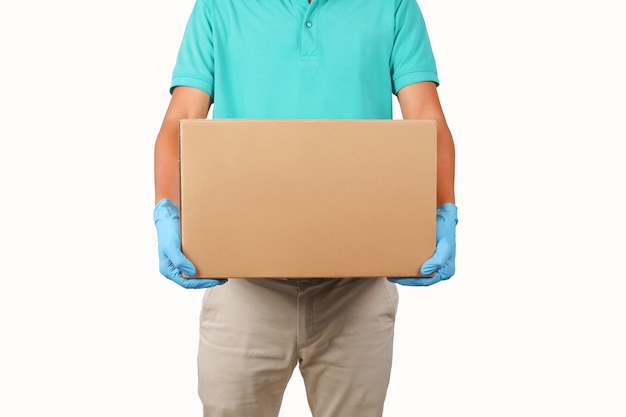 Photo delivery man holding cardboard boxes on white