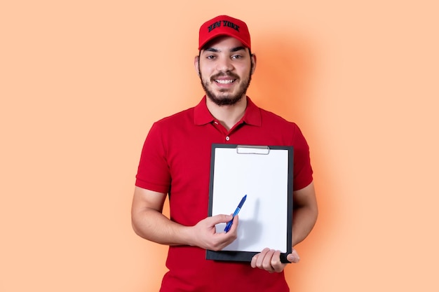 Delivery man holding clipboard and pen