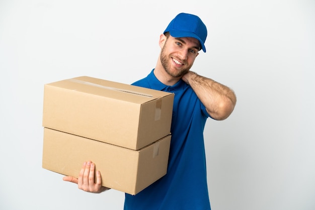 Delivery man over isolated white background laughing