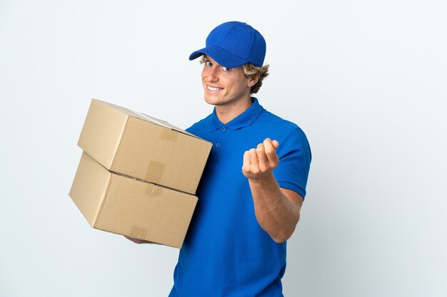 Photo delivery man over isolated white background making money gesture