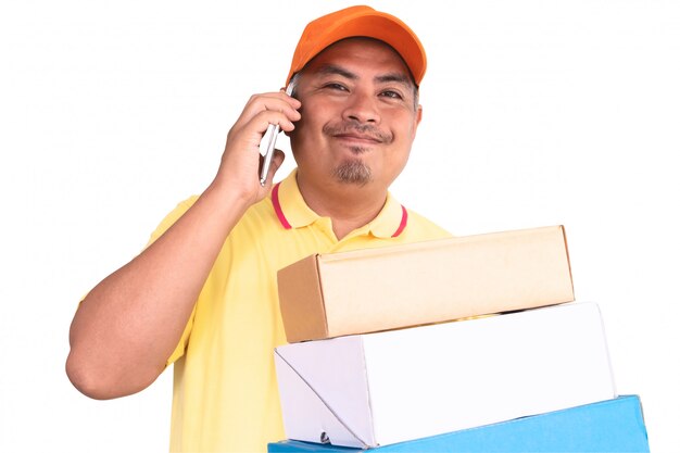 Delivery Man in Orange Cap and Yellow Shirt Carrying Parcel Post Box Sending to Recipient