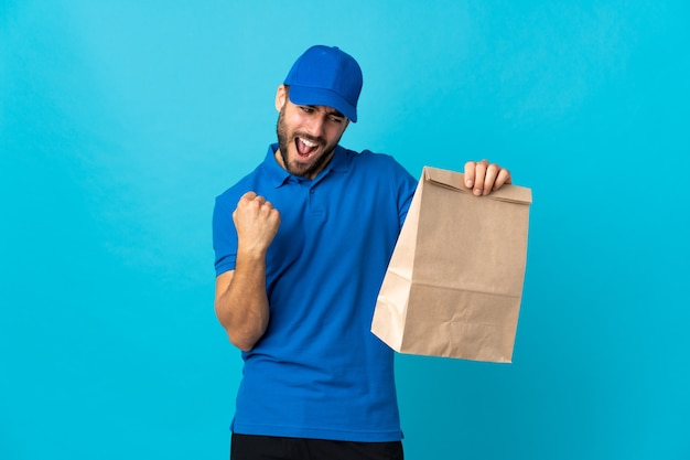 Delivery man with beard celebrating a victory