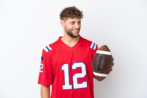 Delivery man with beard over isolated background frustrated and pointing to the front