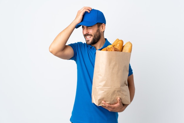 Delivery man with beard in studio