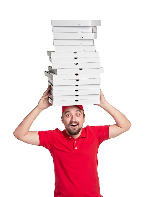 Delivery man with pile of pizza boxes