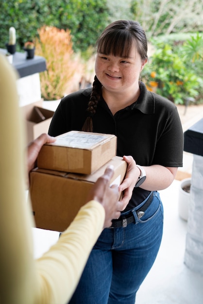 Delivery person getting parcel out for delivery