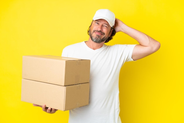 Delivery senior dutch man isolated on yellow background having doubts