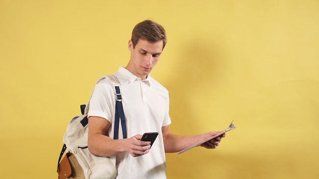 Delivery service Employee, postman is ready to deliver online orders to the destination. Courier on an isolated wall