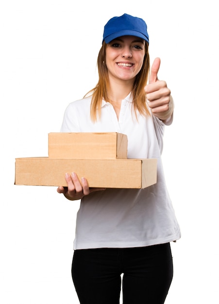 Delivery woman with thumb up