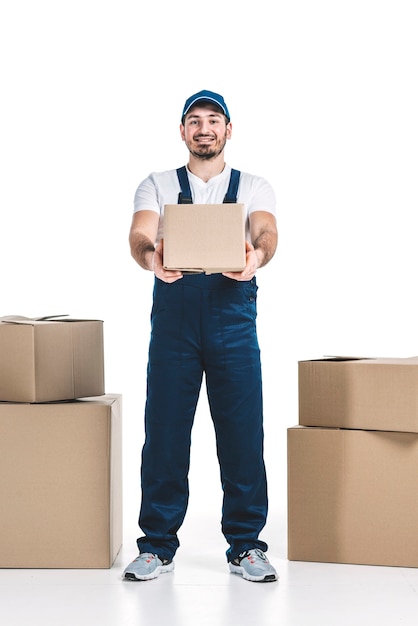 Photo deliveryman giving parcel to camera