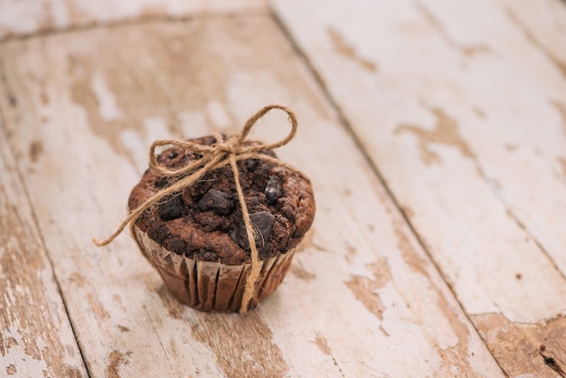 Dellicious homemade chocolate muffin on table. Ready to eat.