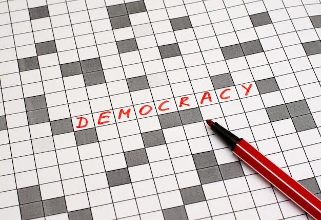 Democracy. Text in crossword. Red letters