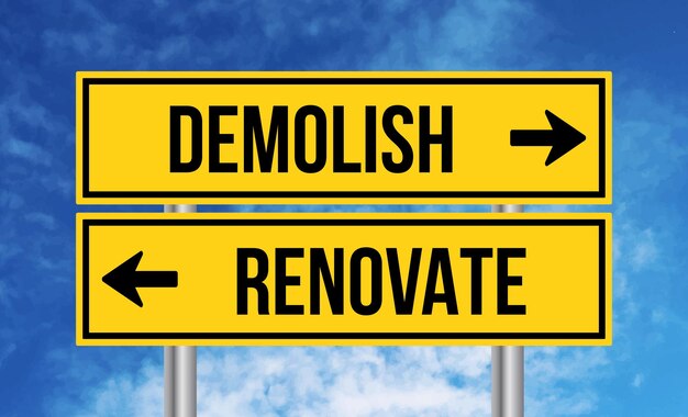 Demolish or renovate road sign on cloudy sky background