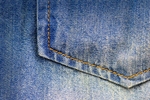 A denim blue jean pocket shot up close