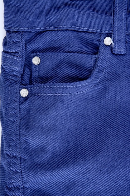 Denim blue jeans pocket detail closeup texture