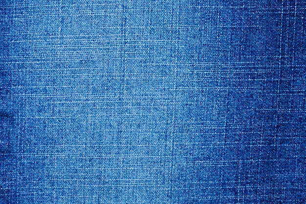 Denim blue jeans texture close up top view