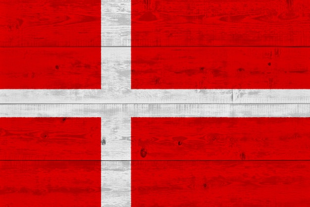 Denmark flag painted on old wood plank