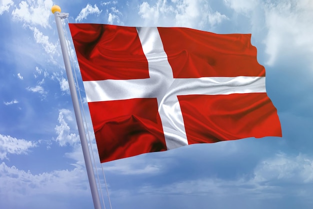 Denmark flag on the sky background