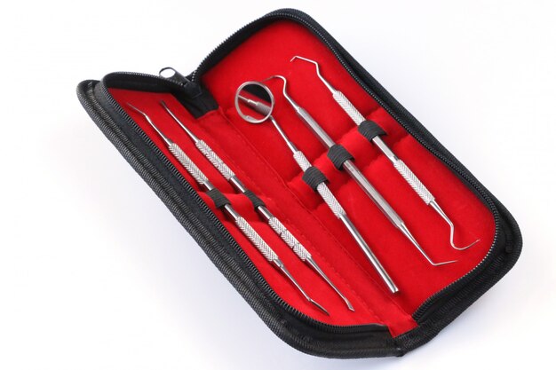 dental care. Dental tools in black and red case 